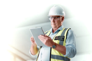 Building, tablet and engineering man inspection check of construction site, property development or design quality assurance. Architecture industry, contractor and technology for renovation progress