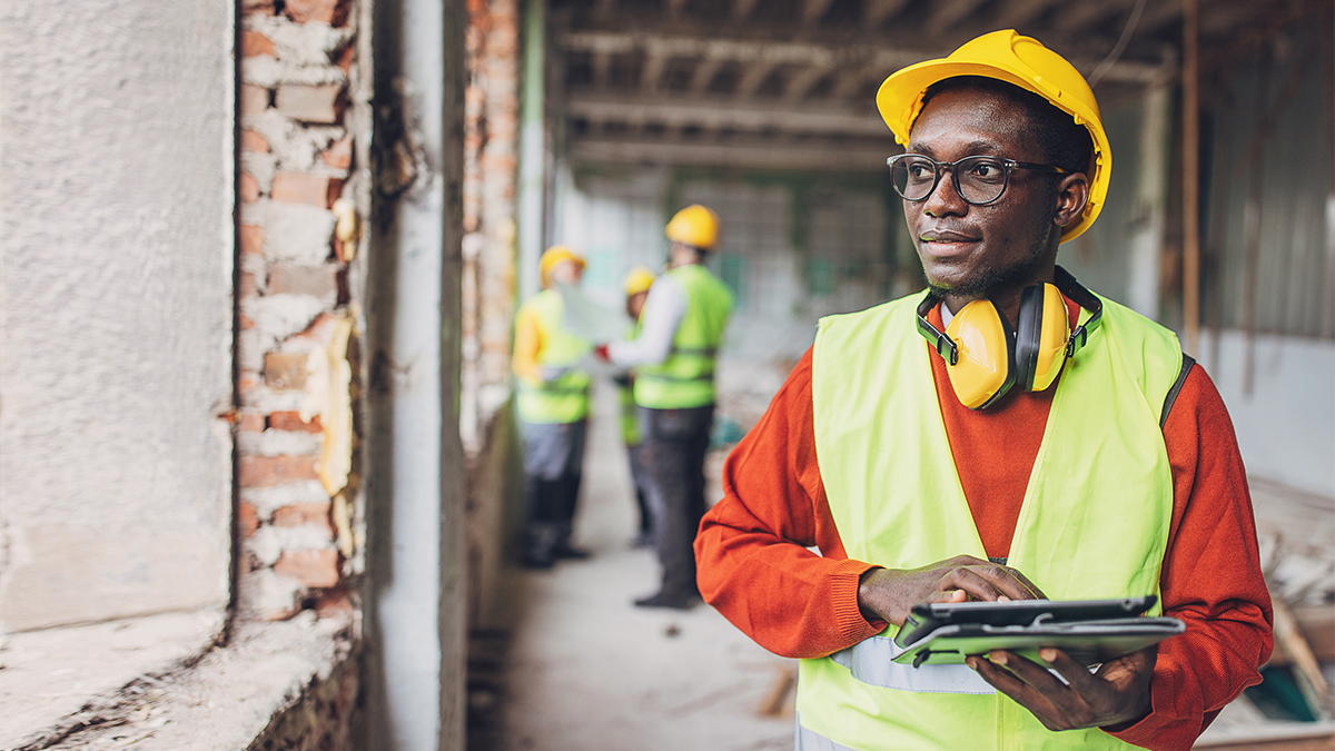 Focused construction supervisor at work site